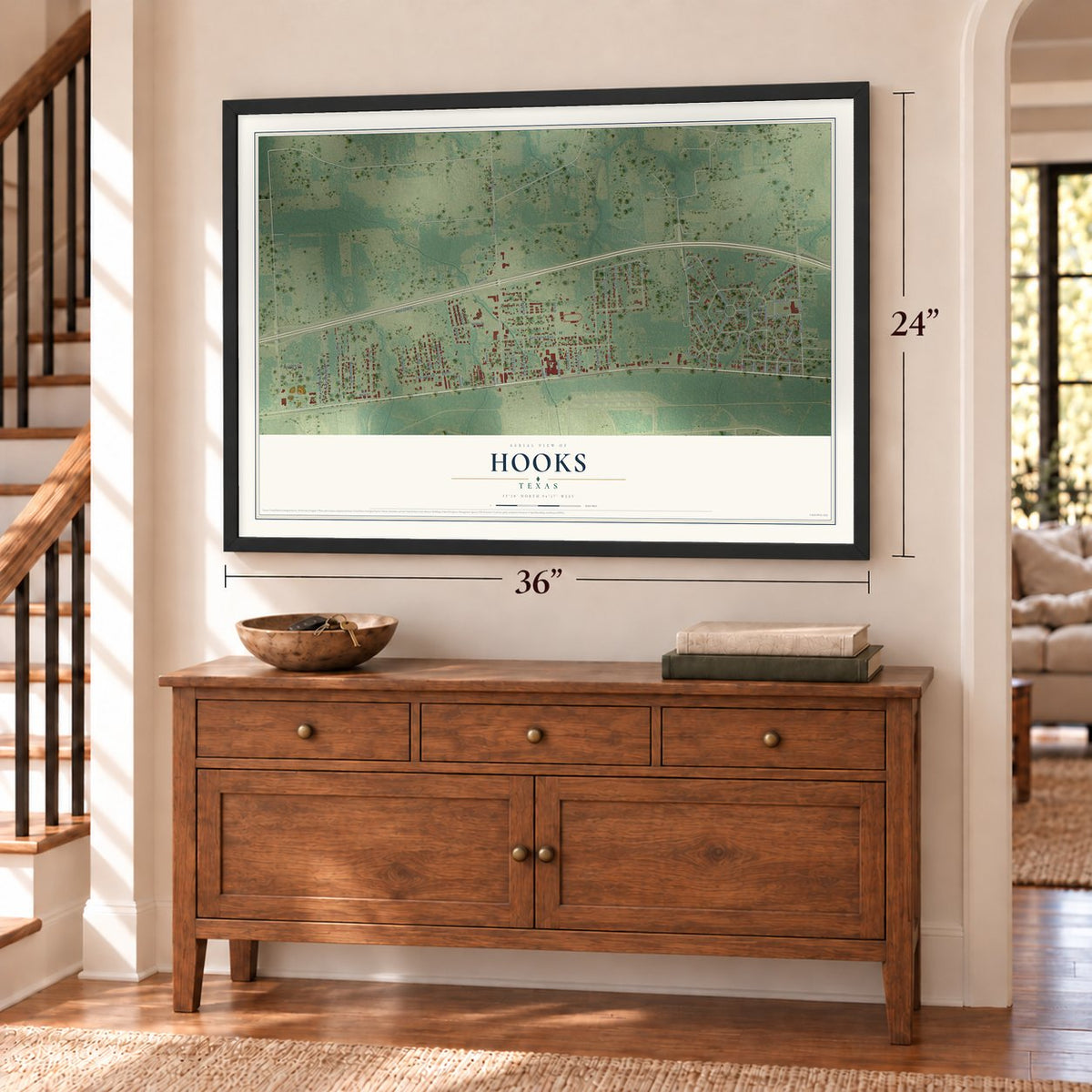 Hooks, Texas map, 24 x 36 inch print in a black frame above a dresser by a staircase