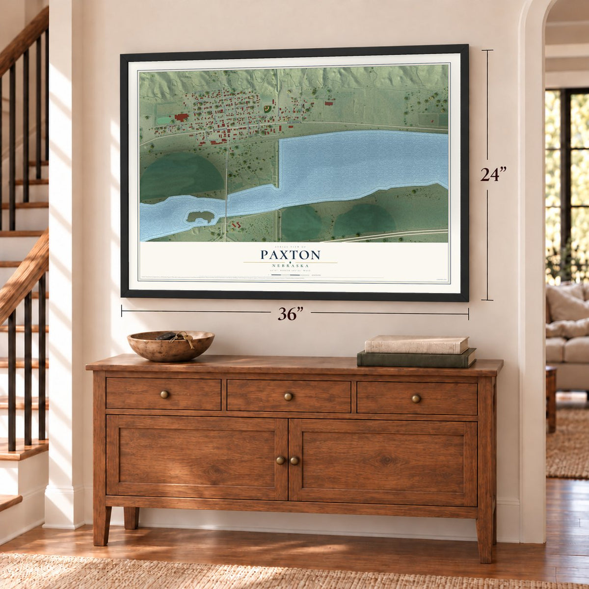 Paxton, Nebraska map, 24 x 36 inch print in a black frame above a dresser by a staircase