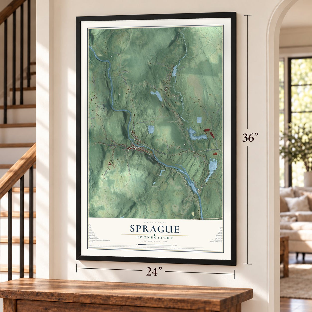 Sprague, Connecticut map, 24 x 36 inch print in a black frame by a staircase