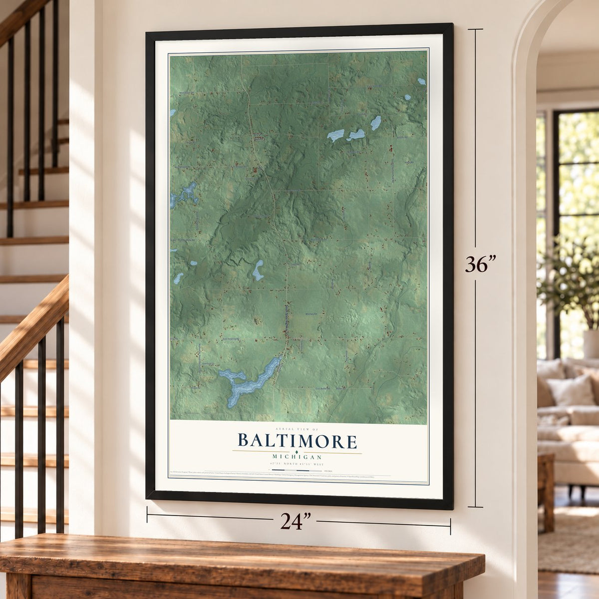 Baltimore, Michigan map, 24 x 36 inch print in a black frame by a staircase