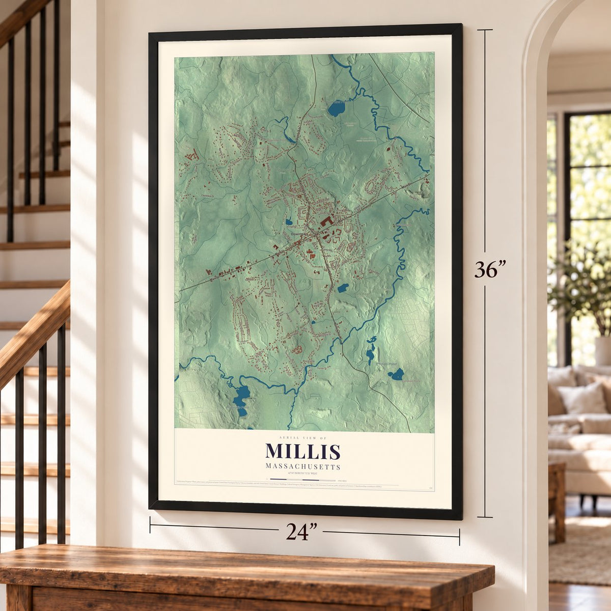 Millis, Massachusetts map, 24 x 36 inch print in a black frame by a staircase