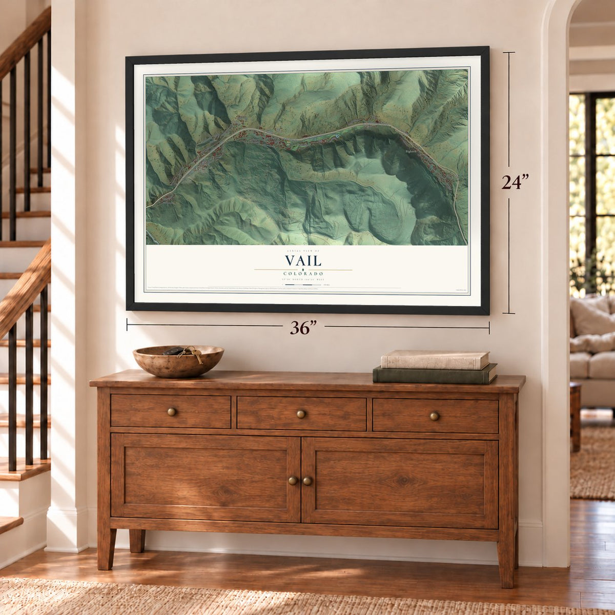 Vail, Colorado map, 24 x 36 inch print in a black frame above a dresser by a staircase