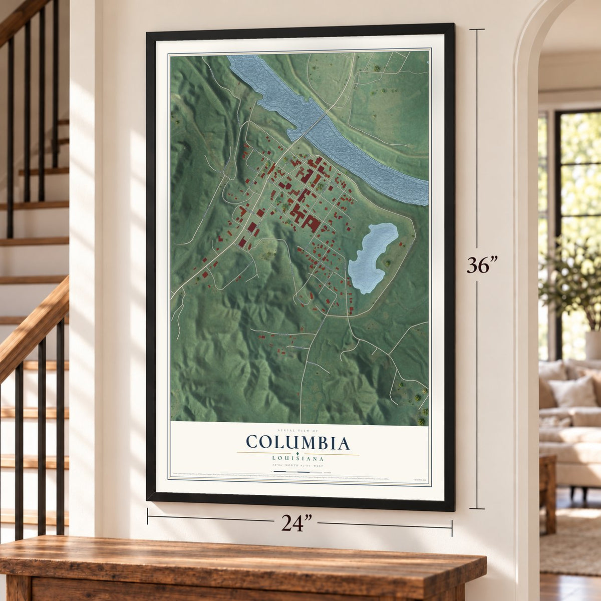 Columbia, Louisiana map, 24 x 36 inch print in a black frame by a staircase