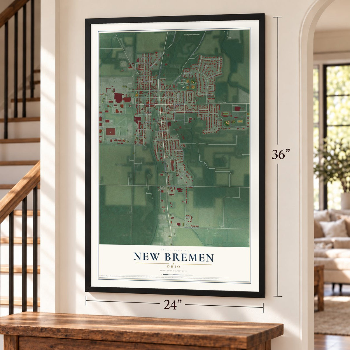 New Bremen, Ohio map, 24 x 36 inch print in a black frame by a staircase