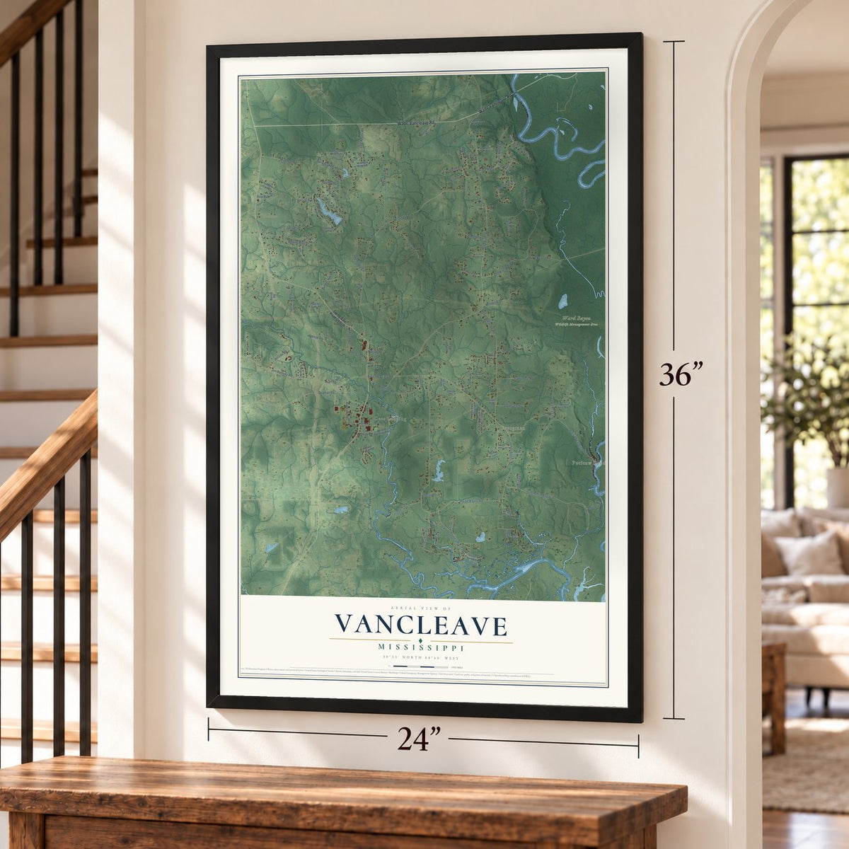 Vancleave, Mississippi map, 24 x 36 inch print in a black frame by a staircase
