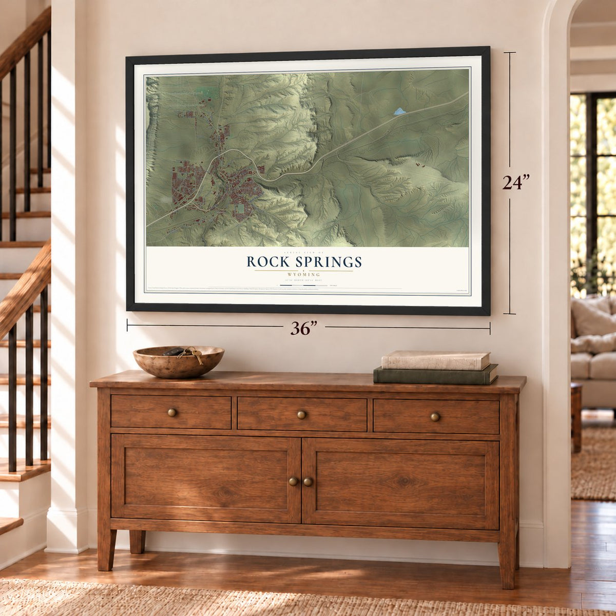 Rock Springs, Wyoming map, 24 x 36 inch print in a black frame above a dresser by a staircase
