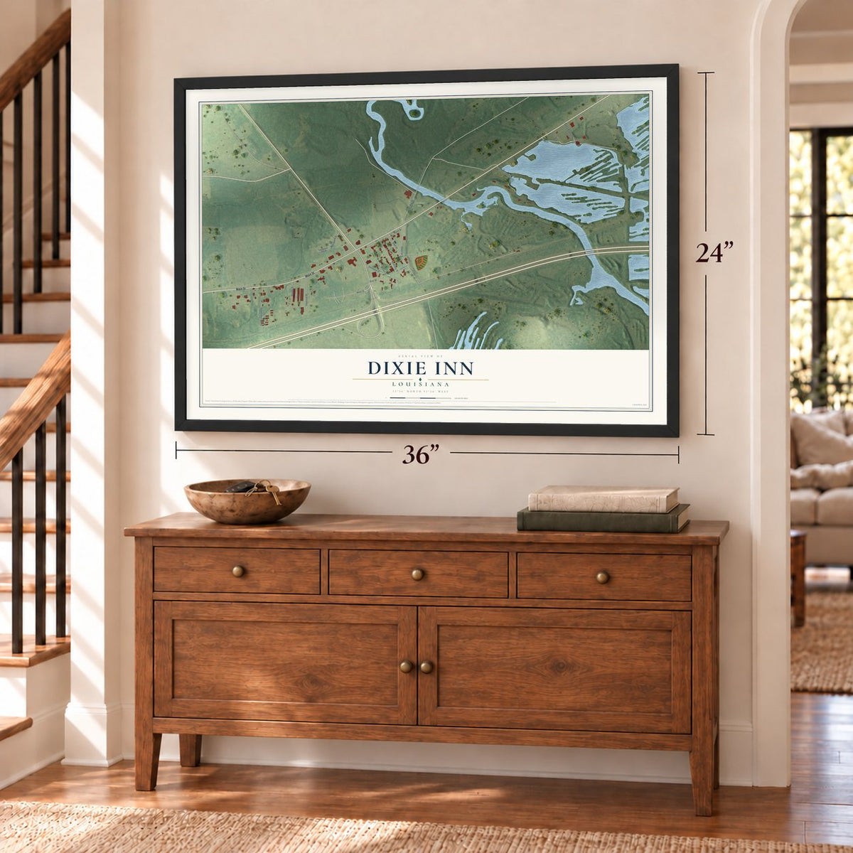 Dixie Inn, Louisiana map, 24 x 36 inch print in a black frame above a dresser by a staircase