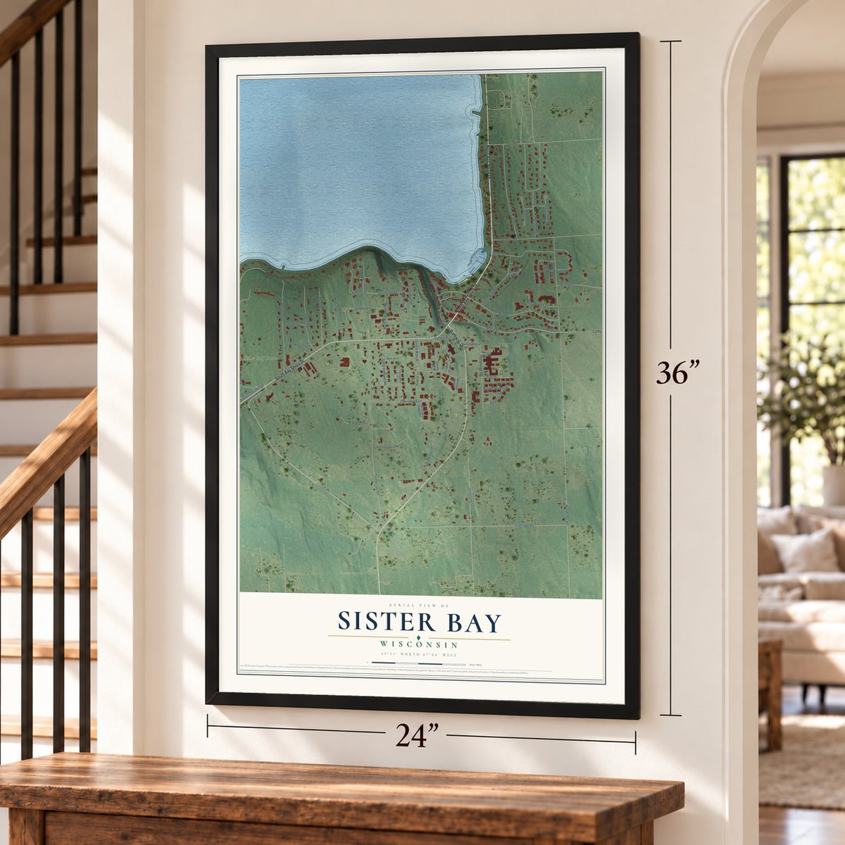 Sister Bay, Wisconsin map, 24 x 36 inch print in a black frame by a staircase