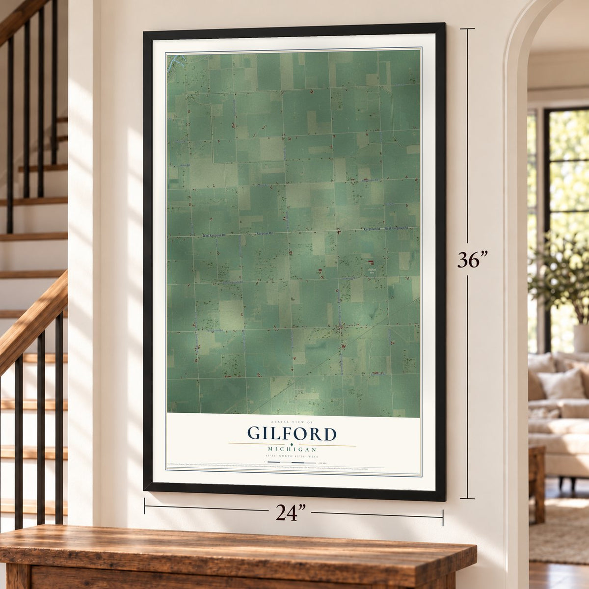 Gilford, Michigan map, 24 x 36 inch print in a black frame by a staircase