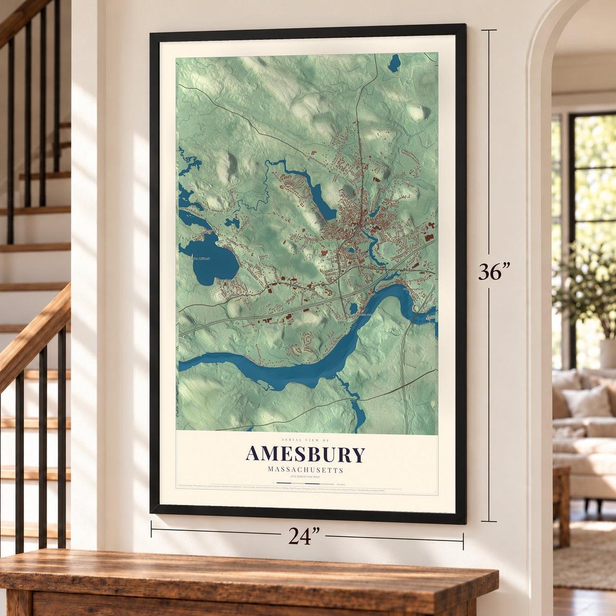 Amesbury, Massachusetts map, 24 x 36 inch print in a black frame by a staircase