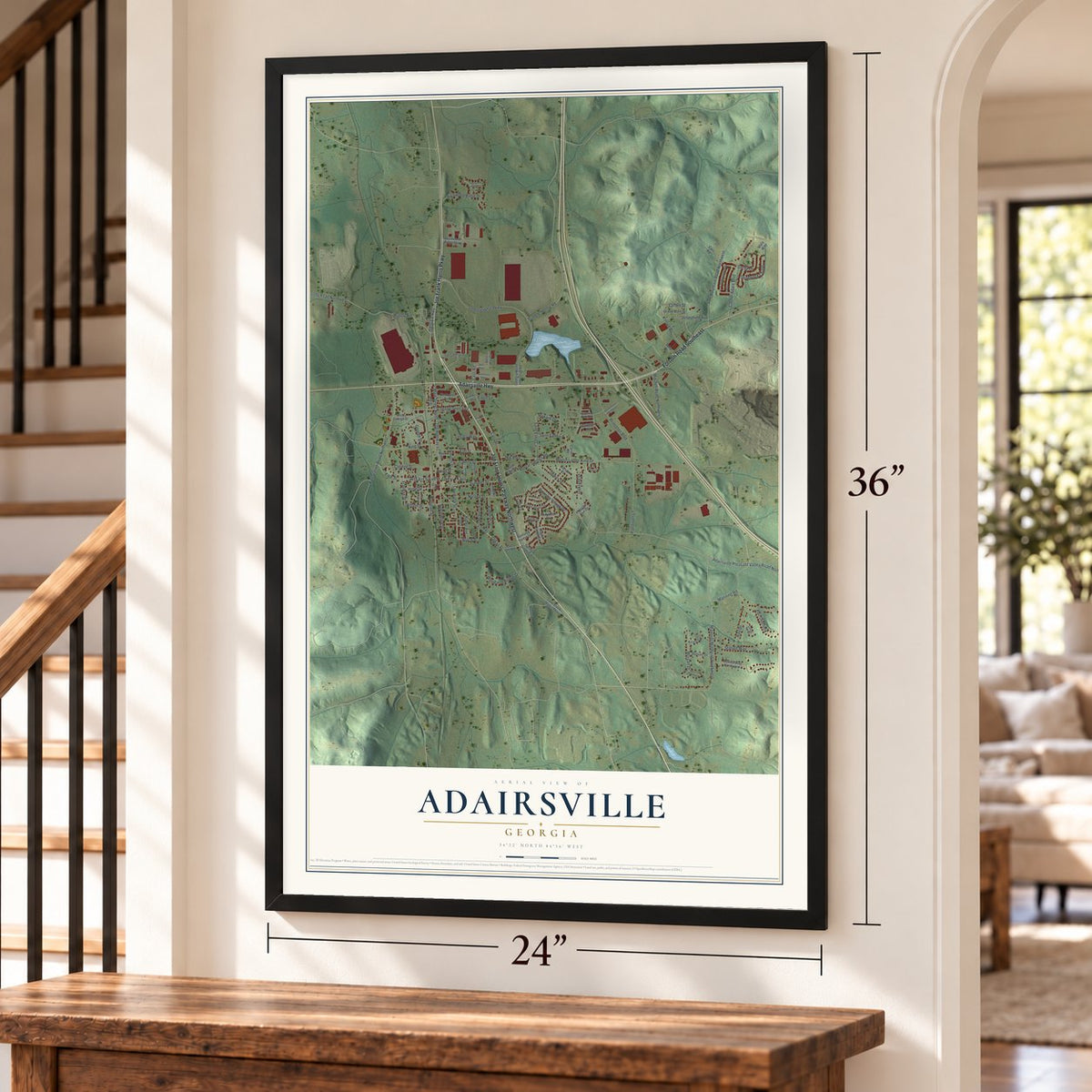 Adairsville, Georgia map, 24 x 36 inch print in a black frame by a staircase