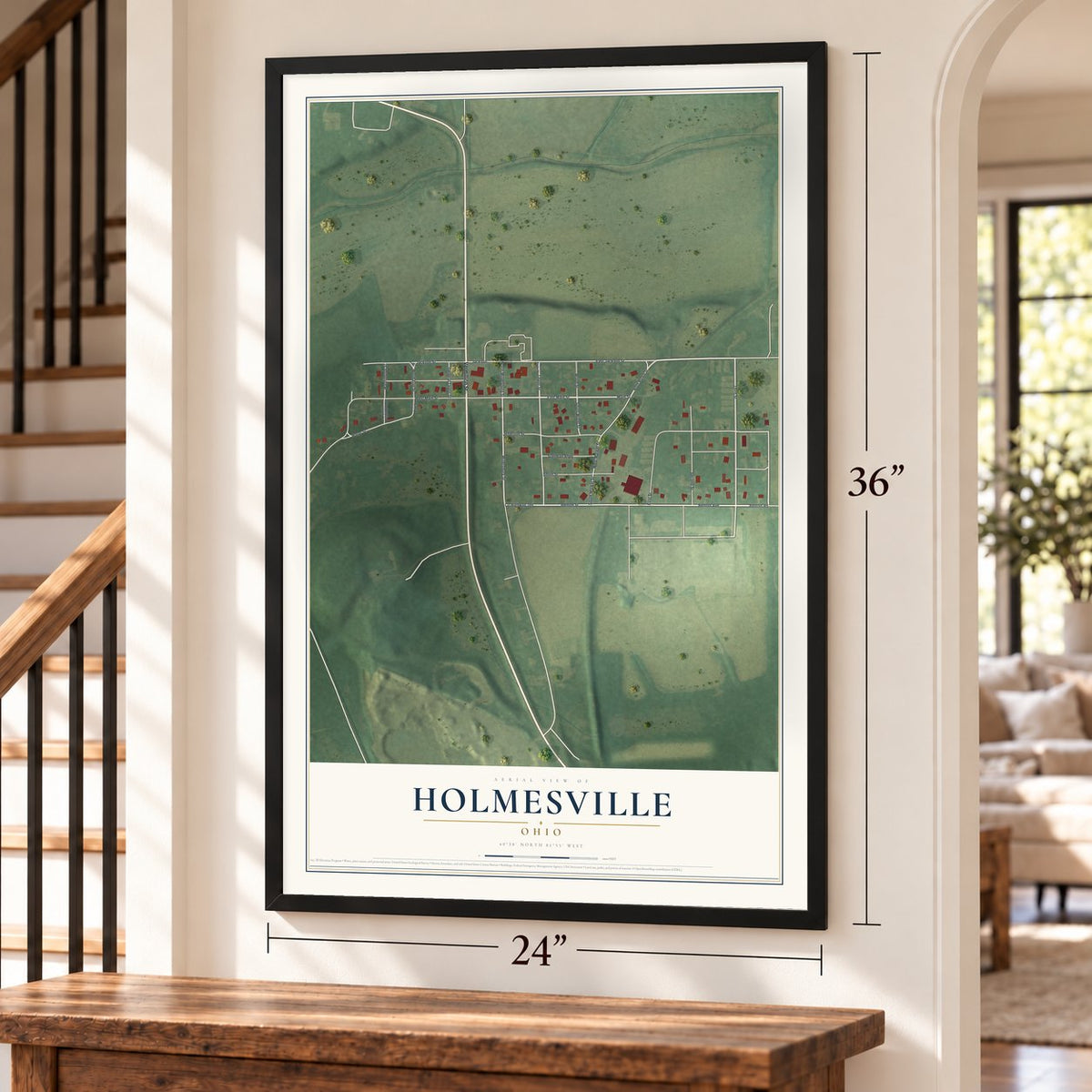 Holmesville, Ohio map, 24 x 36 inch print in a black frame by a staircase