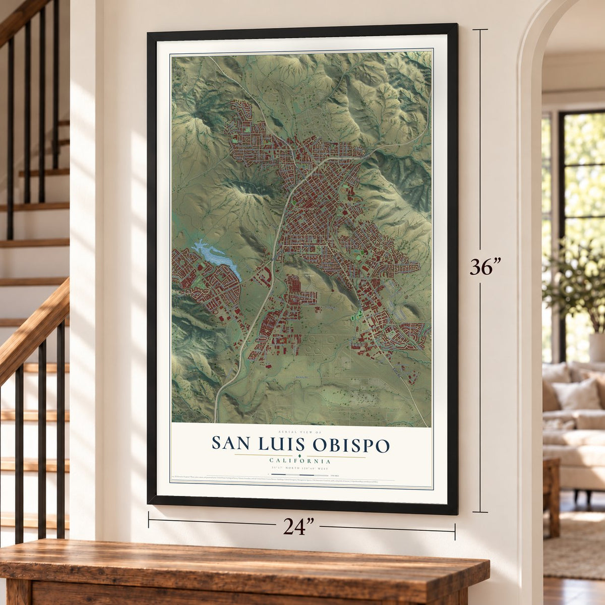 San Luis Obispo, California map, 24 x 36 inch print in a black frame by a staircase