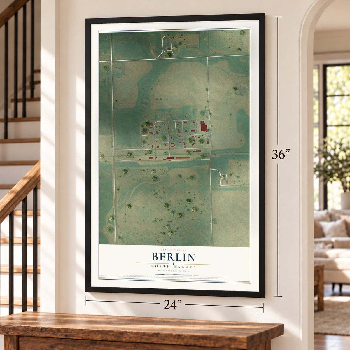 Berlin, North Dakota map, 24 x 36 inch print in a black frame by a staircase
