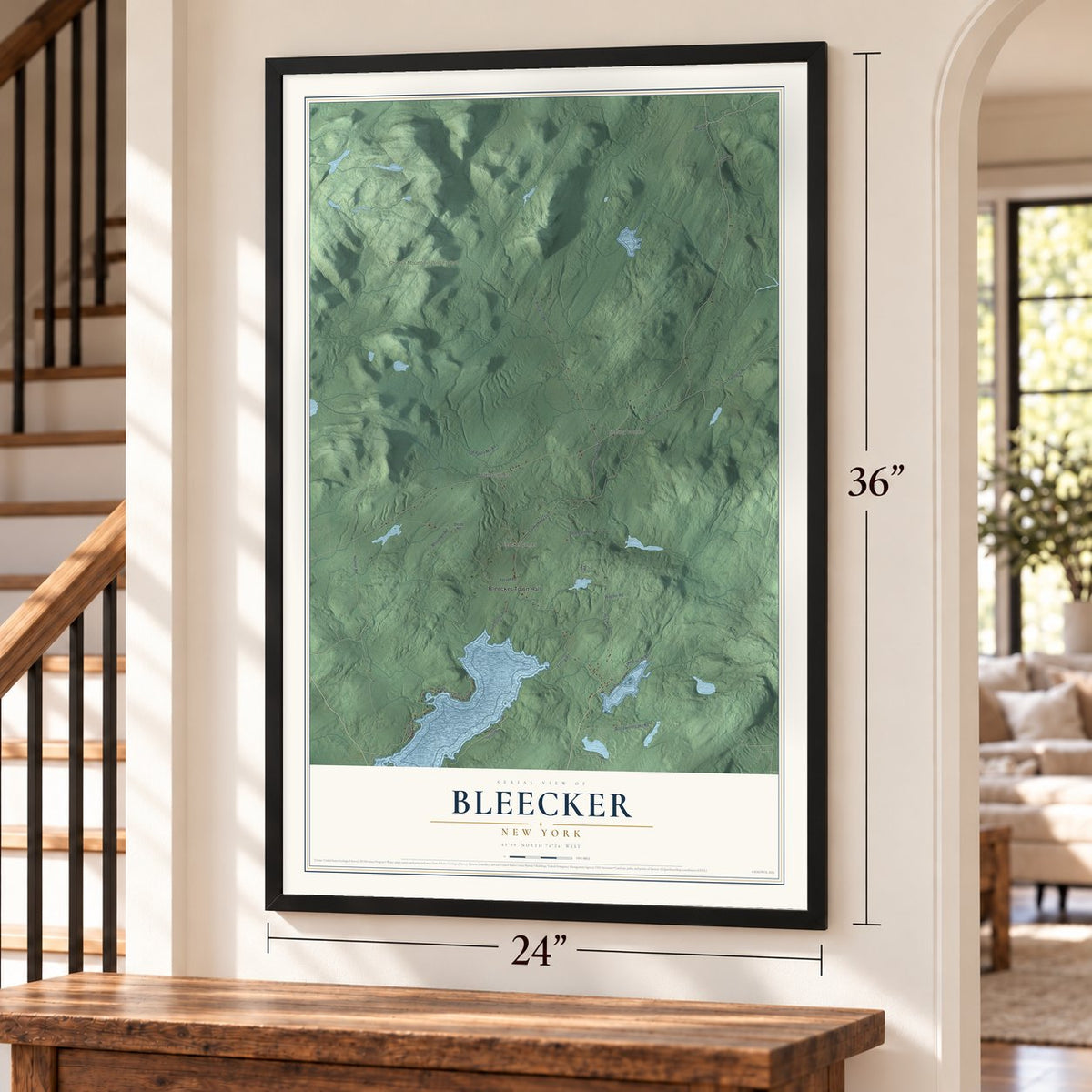 Bleecker, New York map, 24 x 36 inch print in a black frame by a staircase