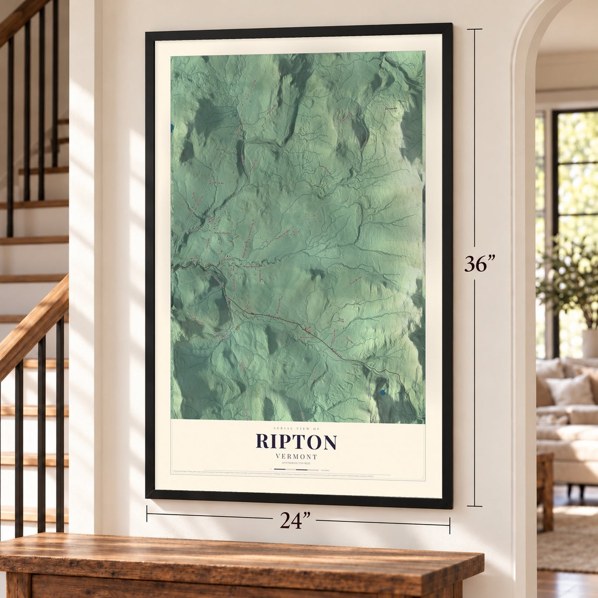 Ripton, Vermont map, 24 x 36 inch print in a black frame by a staircase