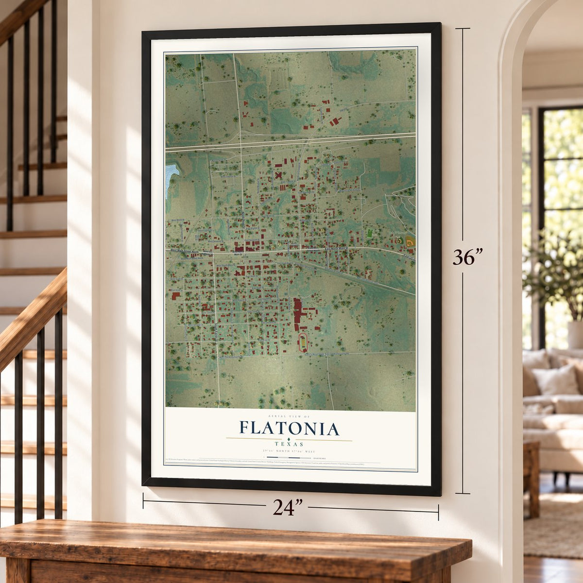 Flatonia, Texas map, 24 x 36 inch print in a black frame by a staircase