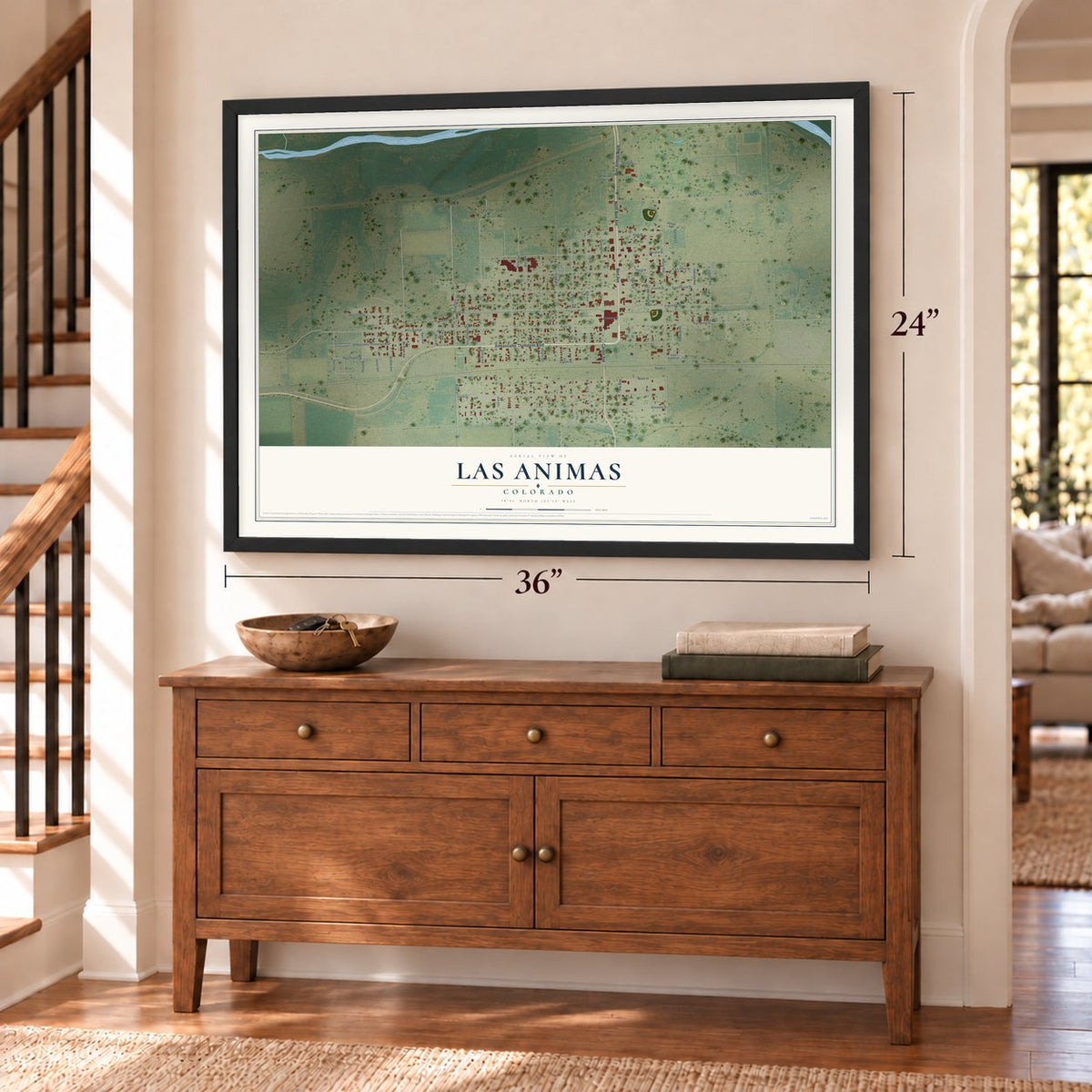 Las Animas, Colorado map, 24 x 36 inch print in a black frame above a dresser by a staircase