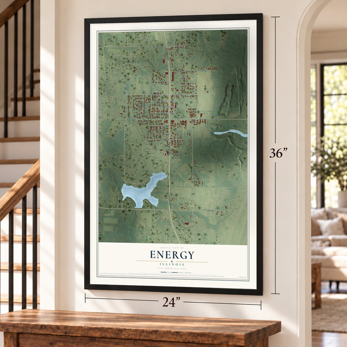 Energy, Illinois map, 24 x 36 inch print in a black frame by a staircase