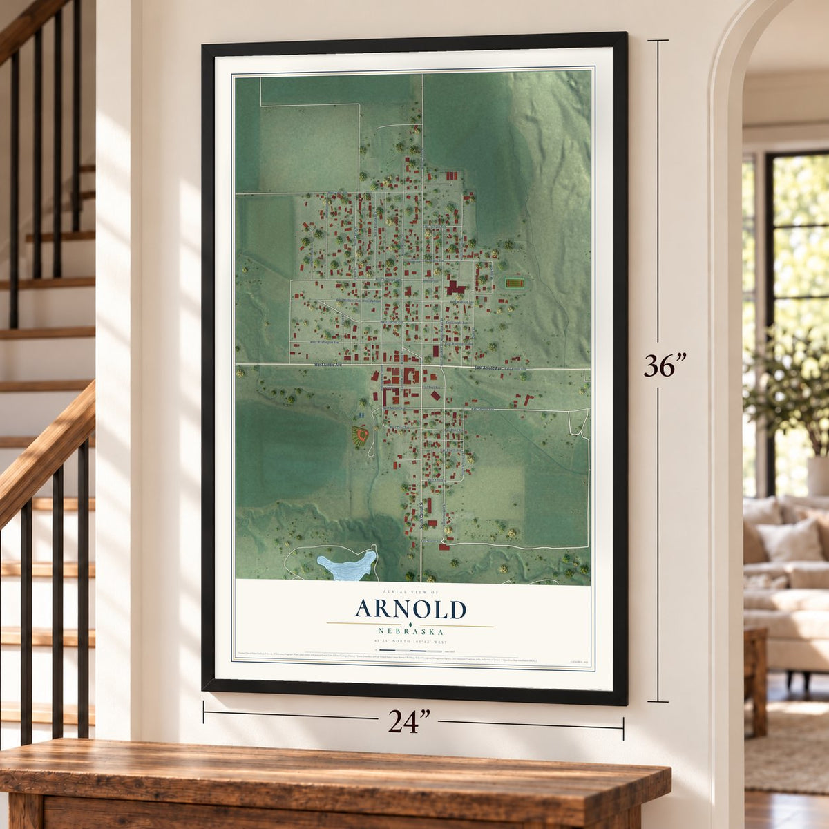 Arnold, Nebraska map, 24 x 36 inch print in a black frame by a staircase