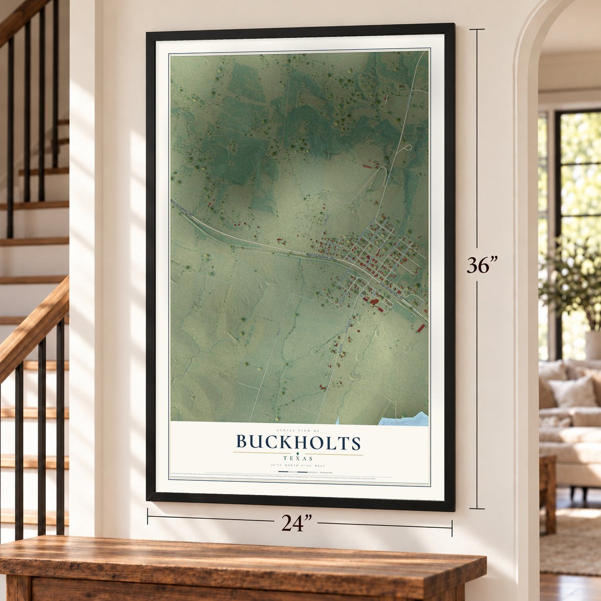 Buckholts, Texas map, 24 x 36 inch print in a black frame by a staircase