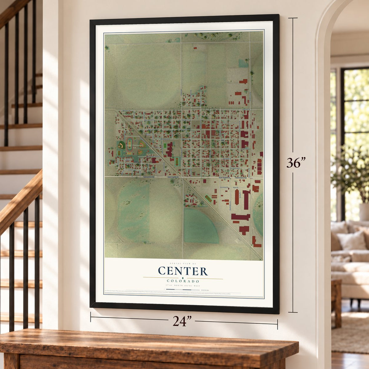 Center, Colorado map, 24 x 36 inch print in a black frame by a staircase