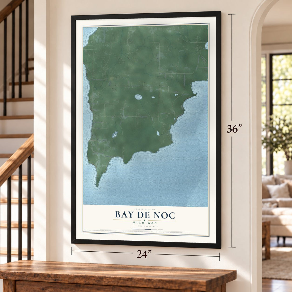 Bay de Noc, Michigan map, 24 x 36 inch print in a black frame by a staircase