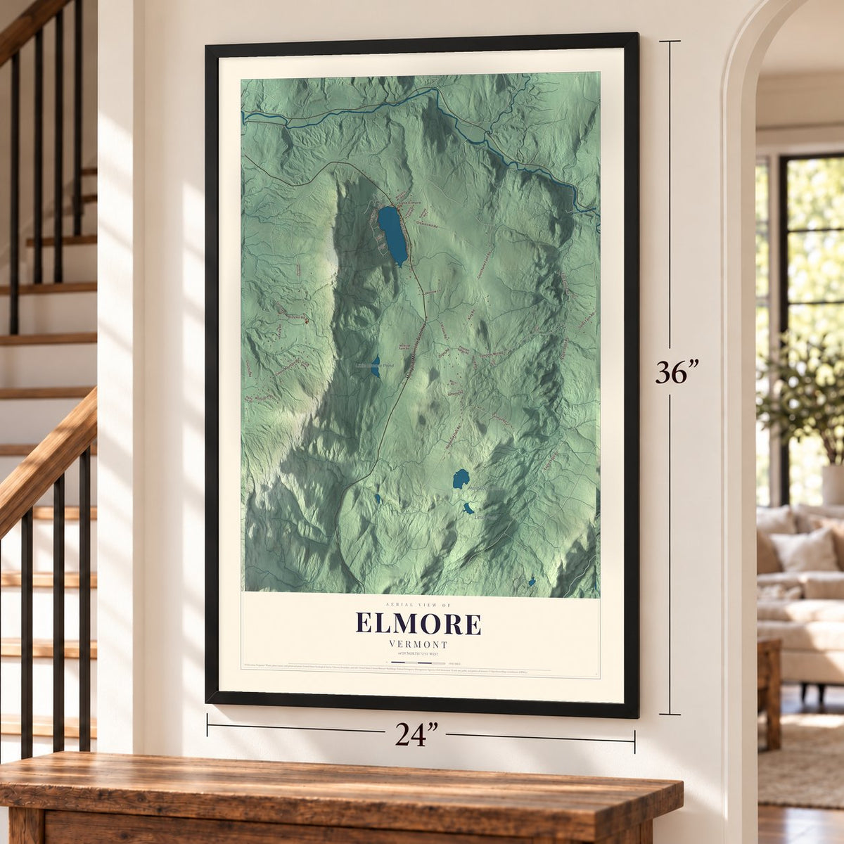 Elmore, Vermont map, 24 x 36 inch print in a black frame by a staircase