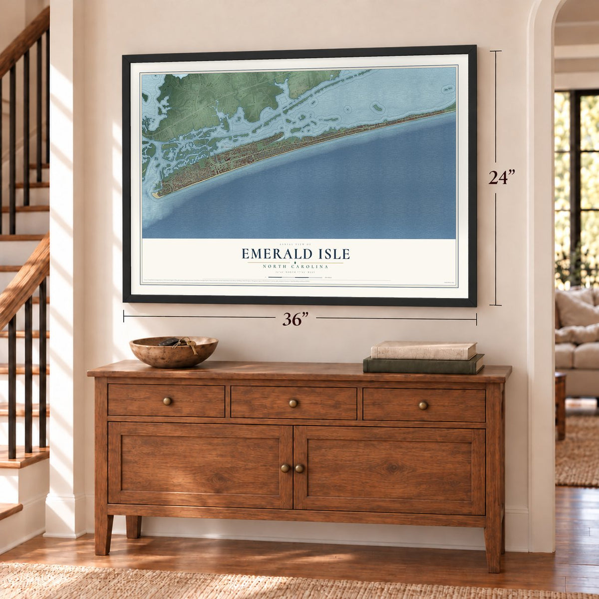 Emerald Isle, North Carolina map, 24 x 36 inch print in a black frame above a dresser by a staircase