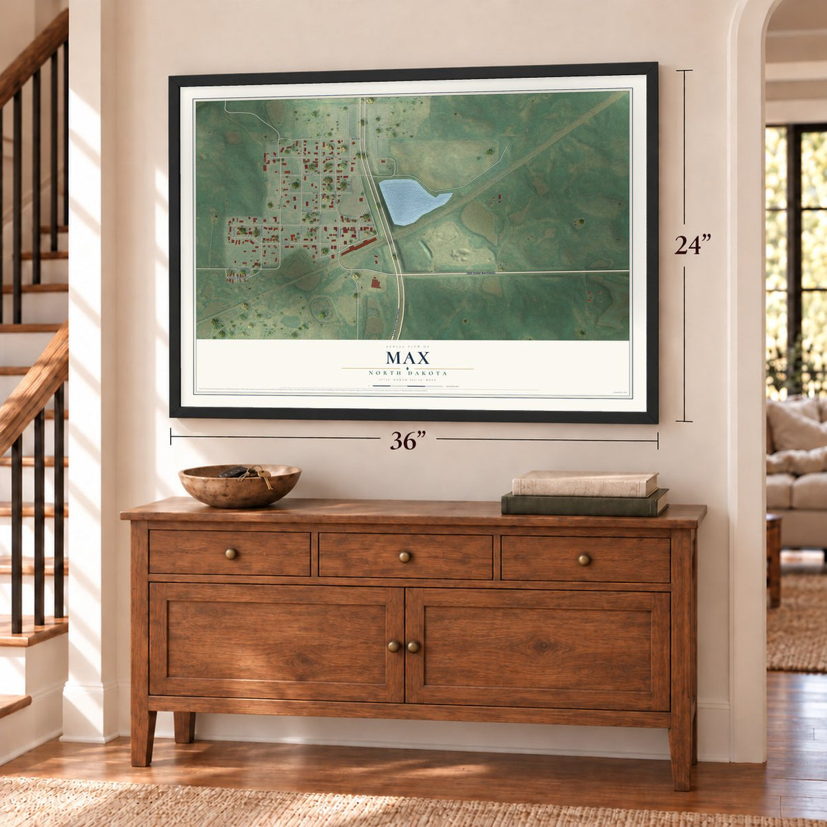 Max, North Dakota map, 24 x 36 inch print in a black frame above a dresser by a staircase