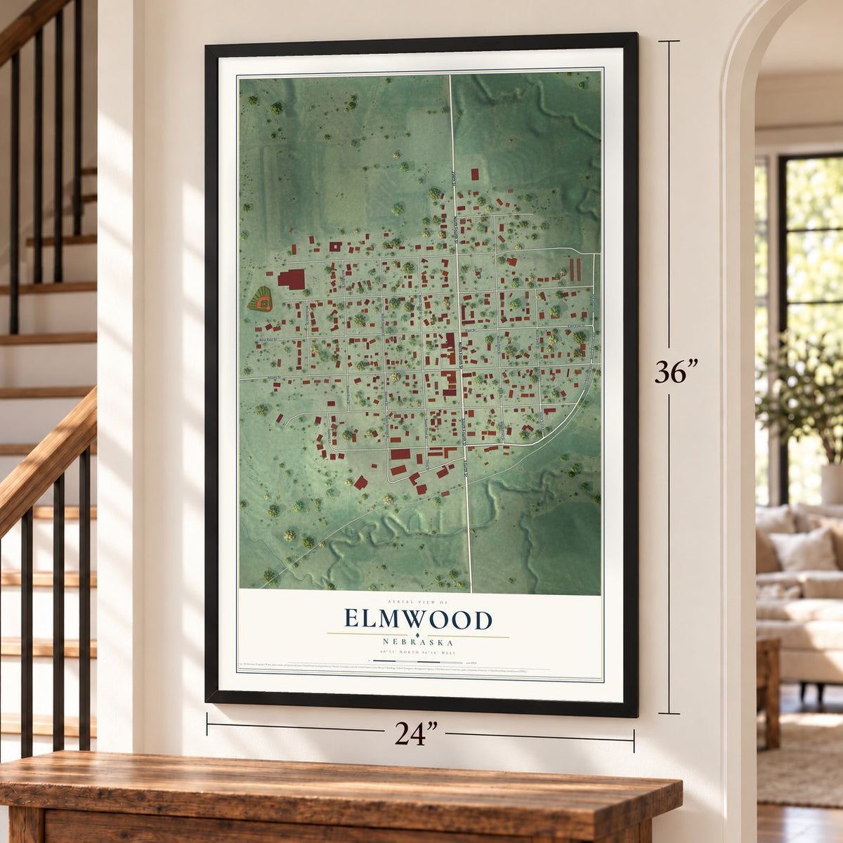 Elmwood, Nebraska map, 24 x 36 inch print in a black frame by a staircase