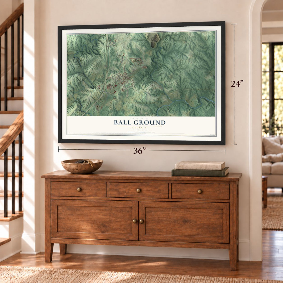 Ball Ground, Georgia map, 24 x 36 inch print in a black frame above a dresser by a staircase