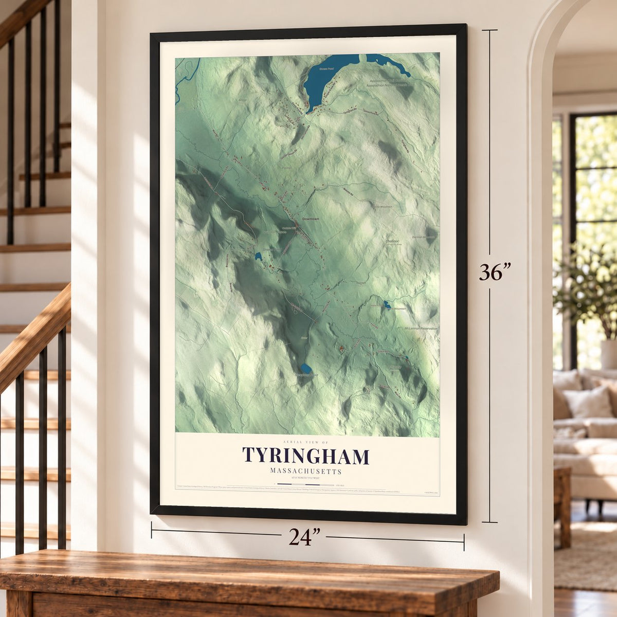 Tyringham, Massachusetts map, 24 x 36 inch print in a black frame by a staircase