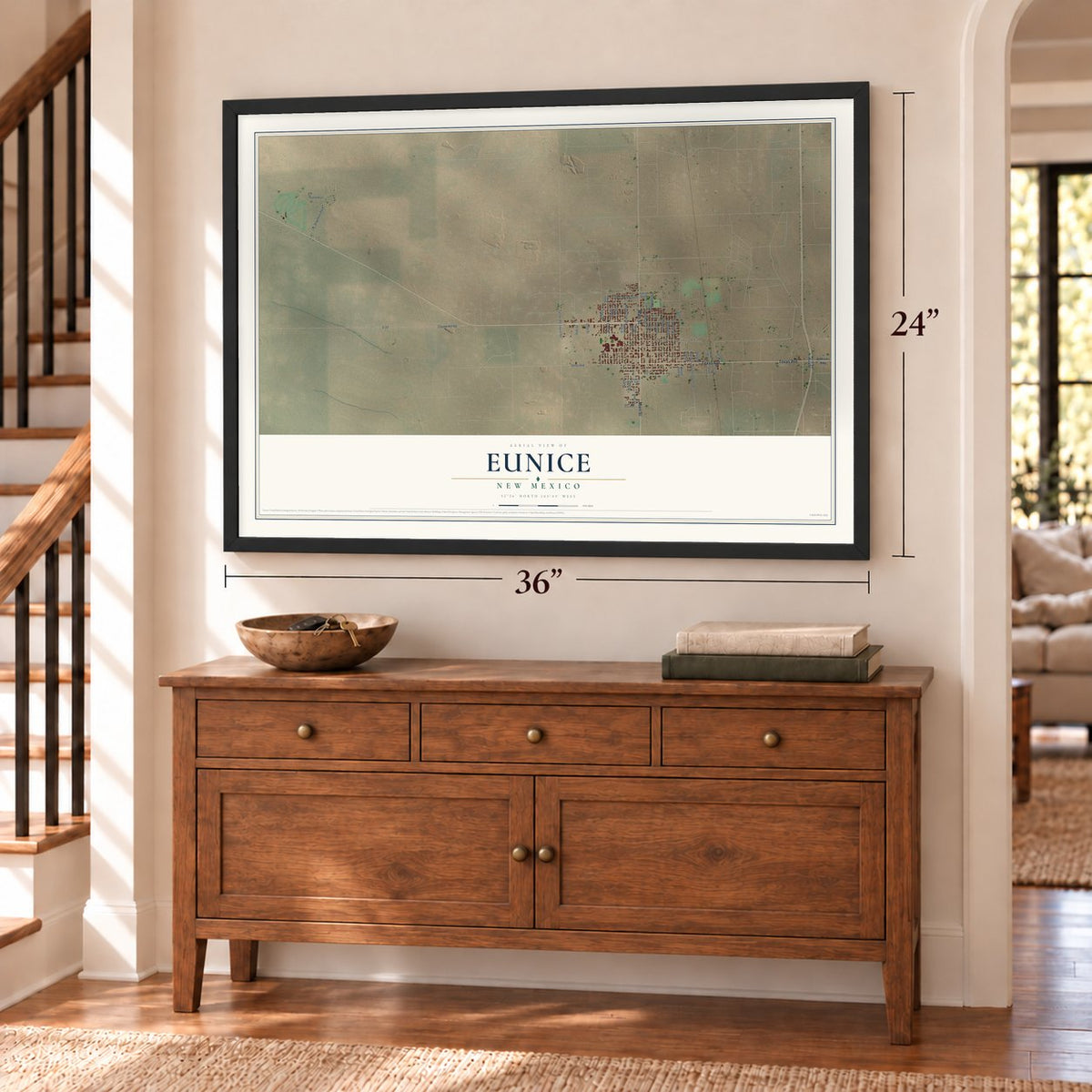 Eunice, New Mexico map, 24 x 36 inch print in a black frame above a dresser by a staircase