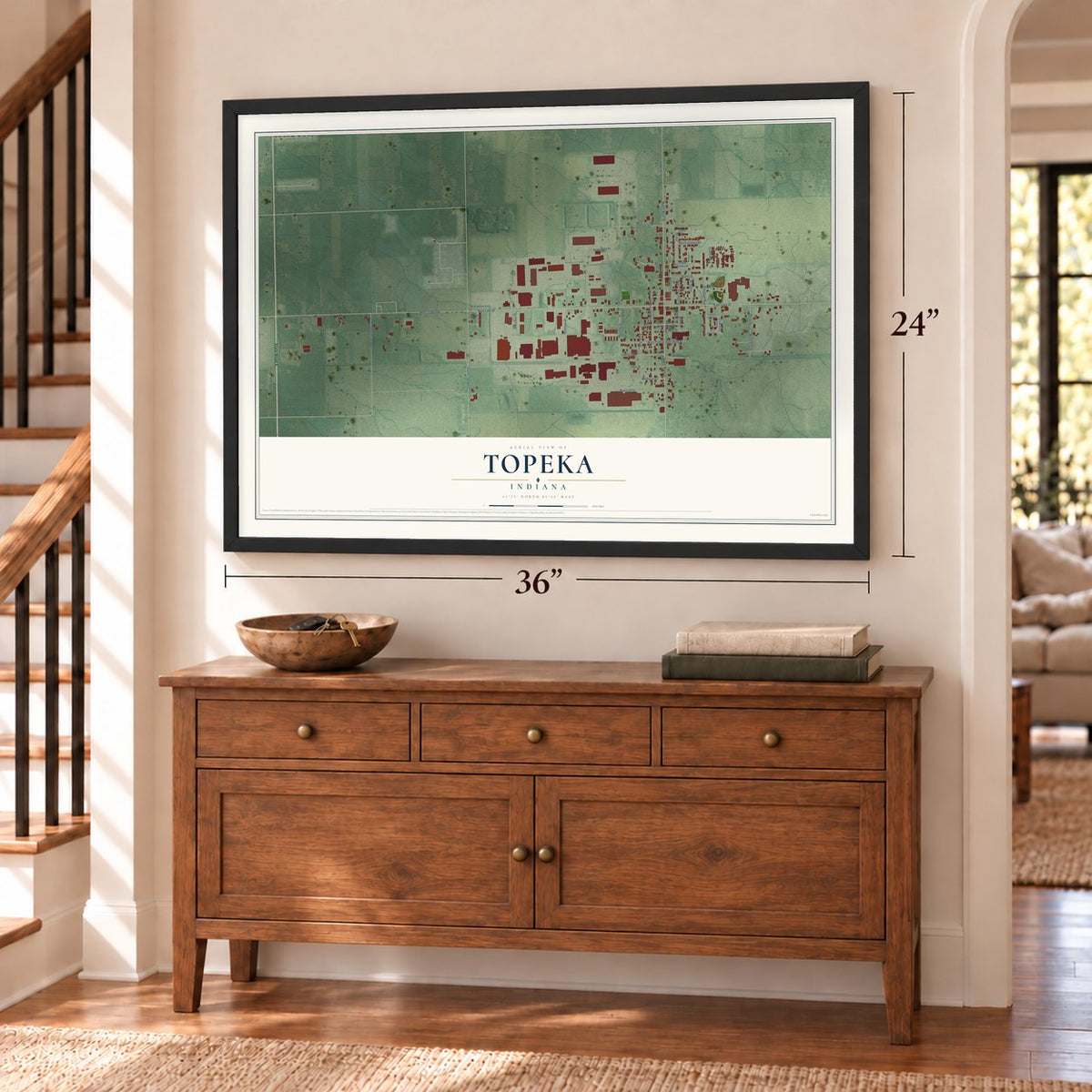 Topeka, Indiana map, 24 x 36 inch print in a black frame above a dresser by a staircase
