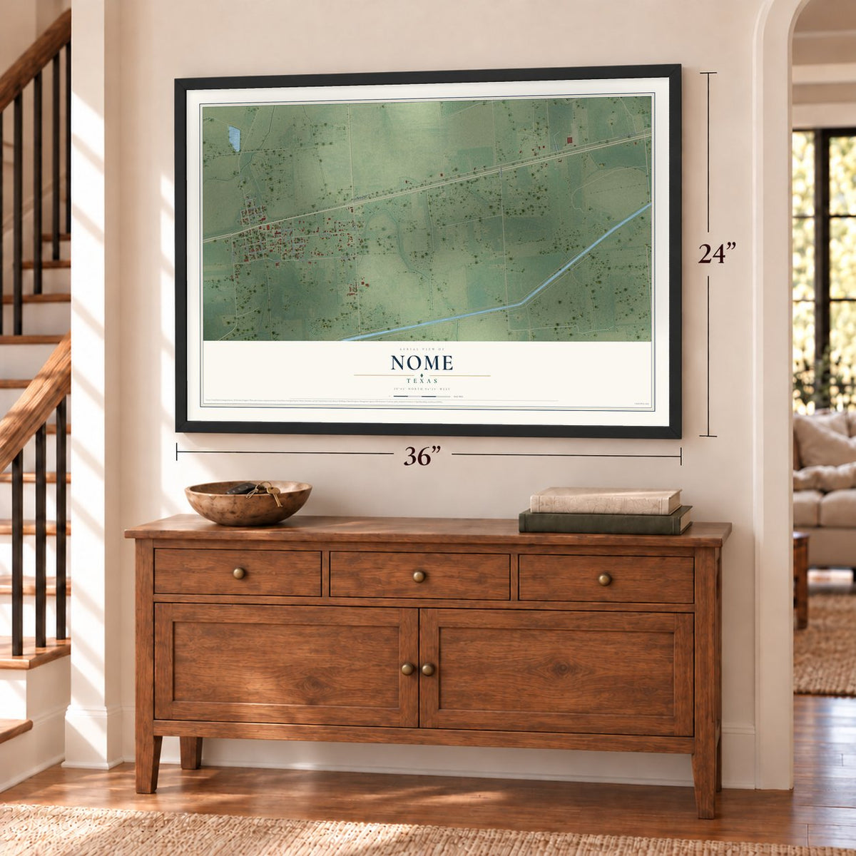 Nome, Texas map, 24 x 36 inch print in a black frame above a dresser by a staircase