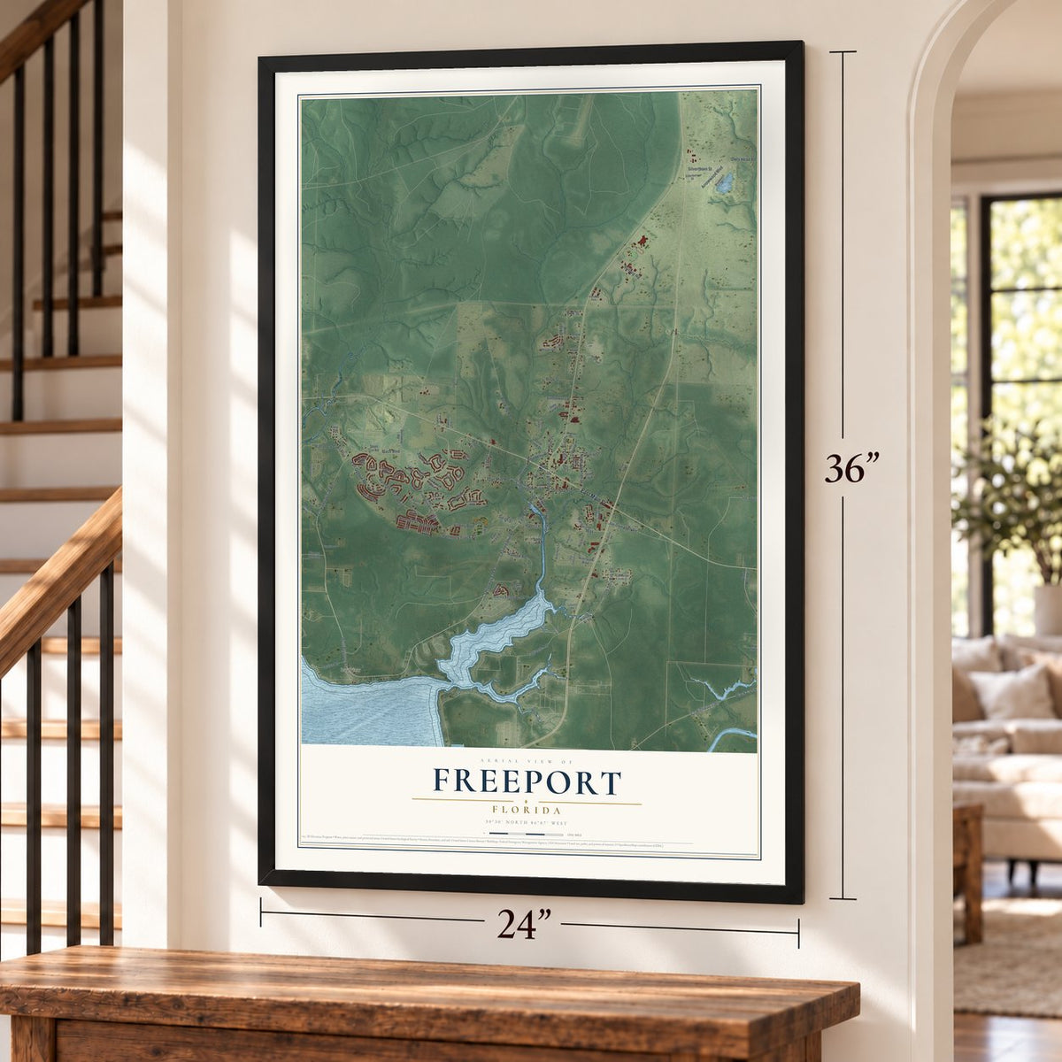 Freeport, Florida map, 24 x 36 inch print in a black frame by a staircase
