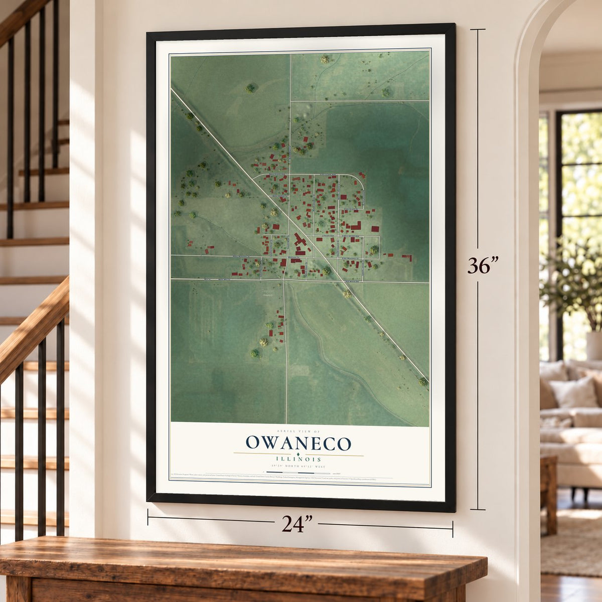 Owaneco, Illinois map, 24 x 36 inch print in a black frame by a staircase