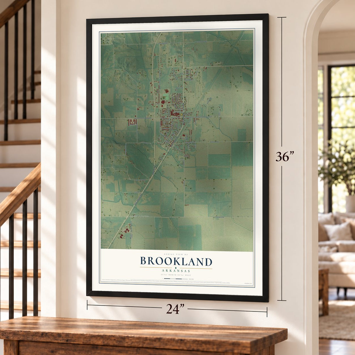 Brookland, Arkansas map, 24 x 36 inch print in a black frame by a staircase