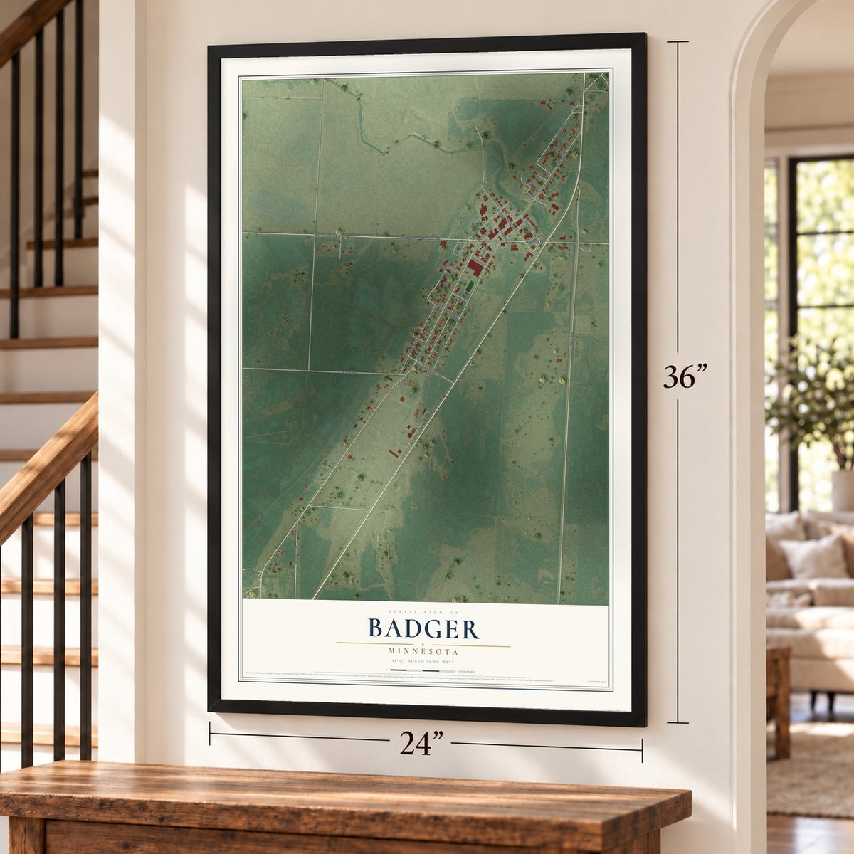 Badger, Minnesota map, 24 x 36 inch print in a black frame by a staircase