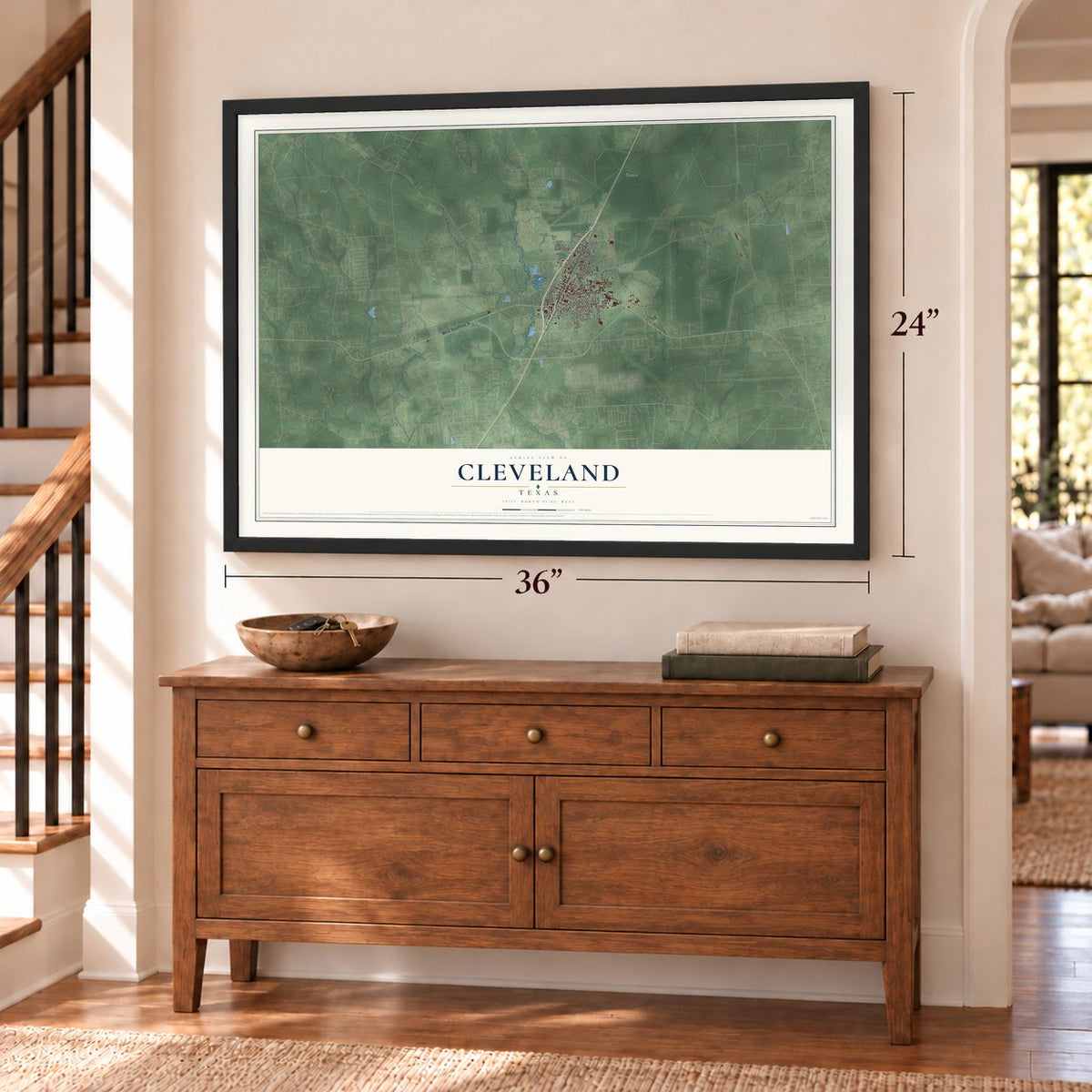 Cleveland, Texas map, 24 x 36 inch print in a black frame above a dresser by a staircase