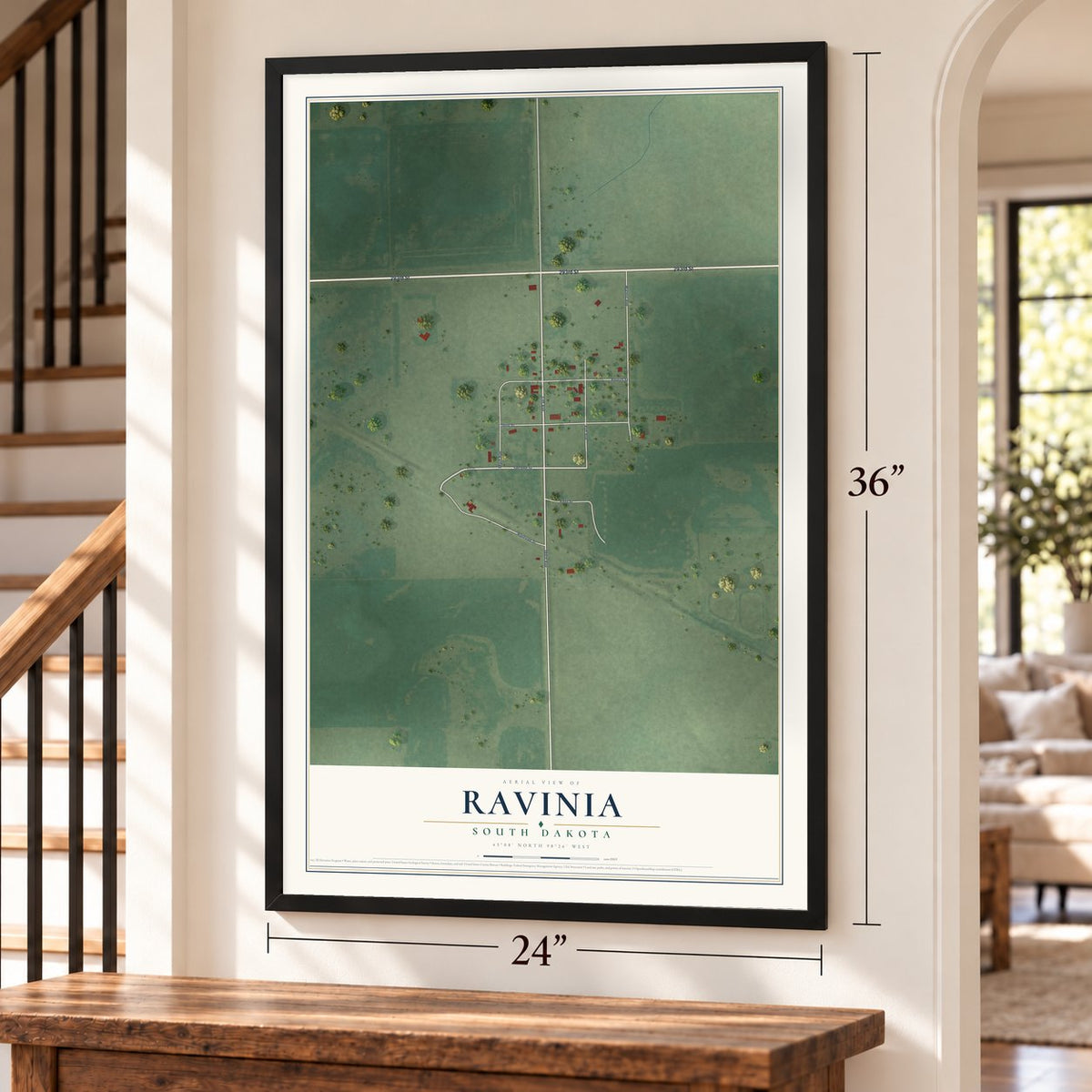 Ravinia, South Dakota map, 24 x 36 inch print in a black frame by a staircase
