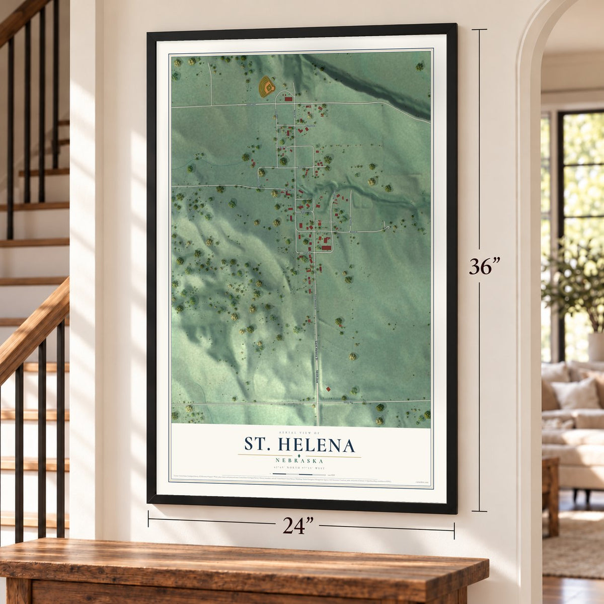 St. Helena, Nebraska map, 24 x 36 inch print in a black frame by a staircase