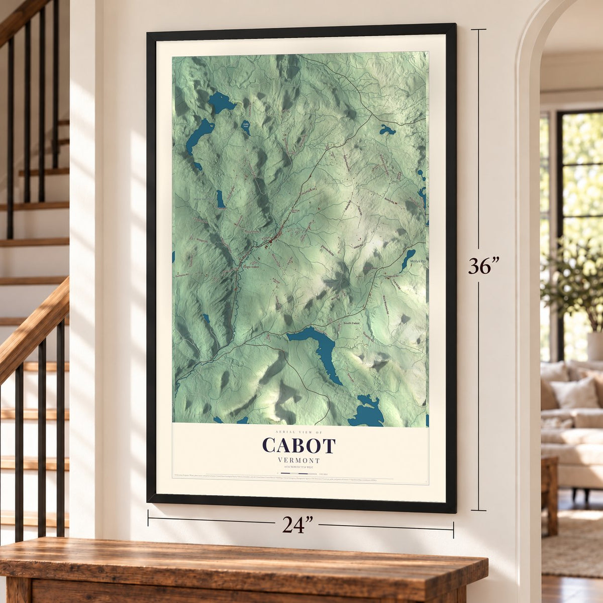 Cabot, Vermont map, 24 x 36 inch print in a black frame by a staircase