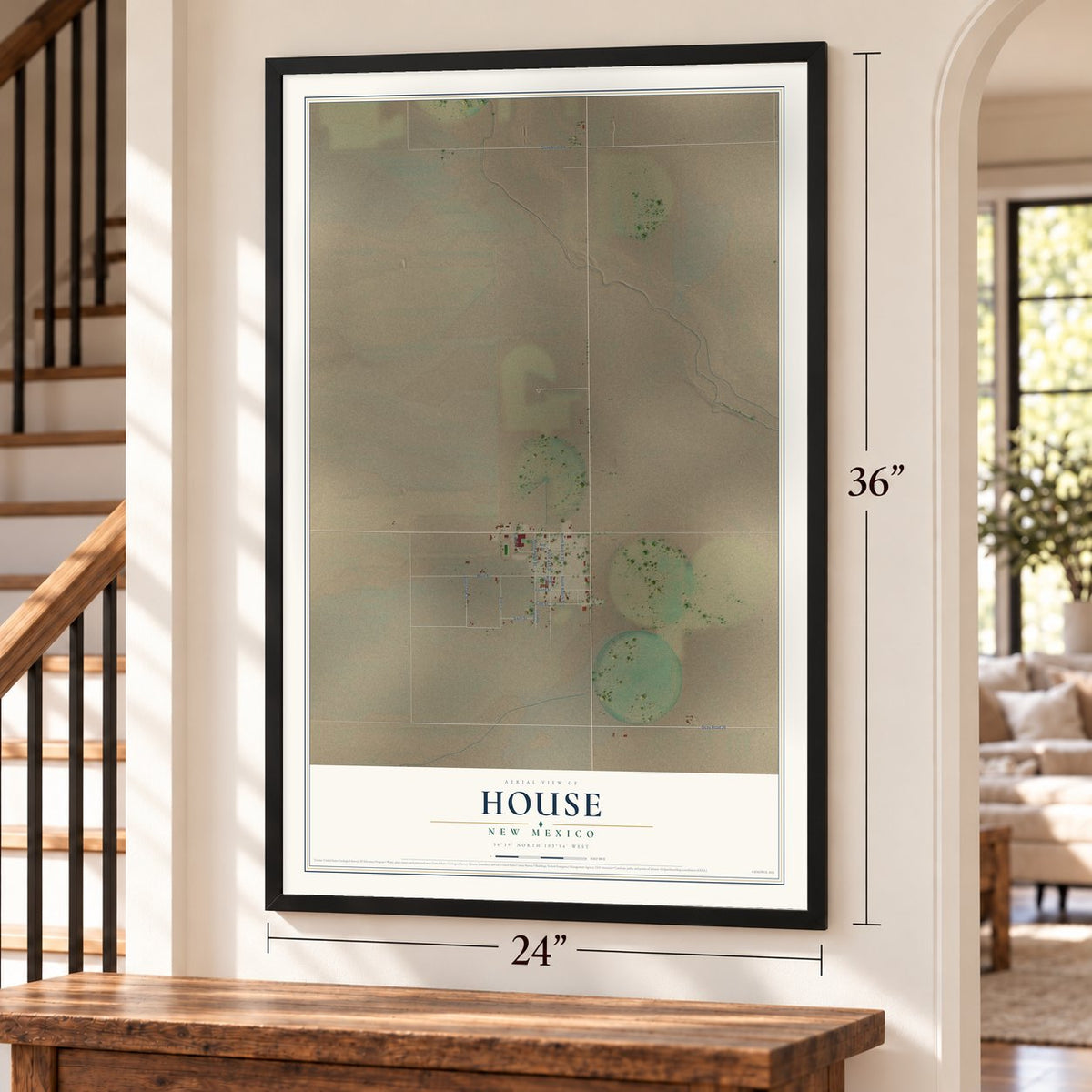House, New Mexico map, 24 x 36 inch print in a black frame by a staircase
