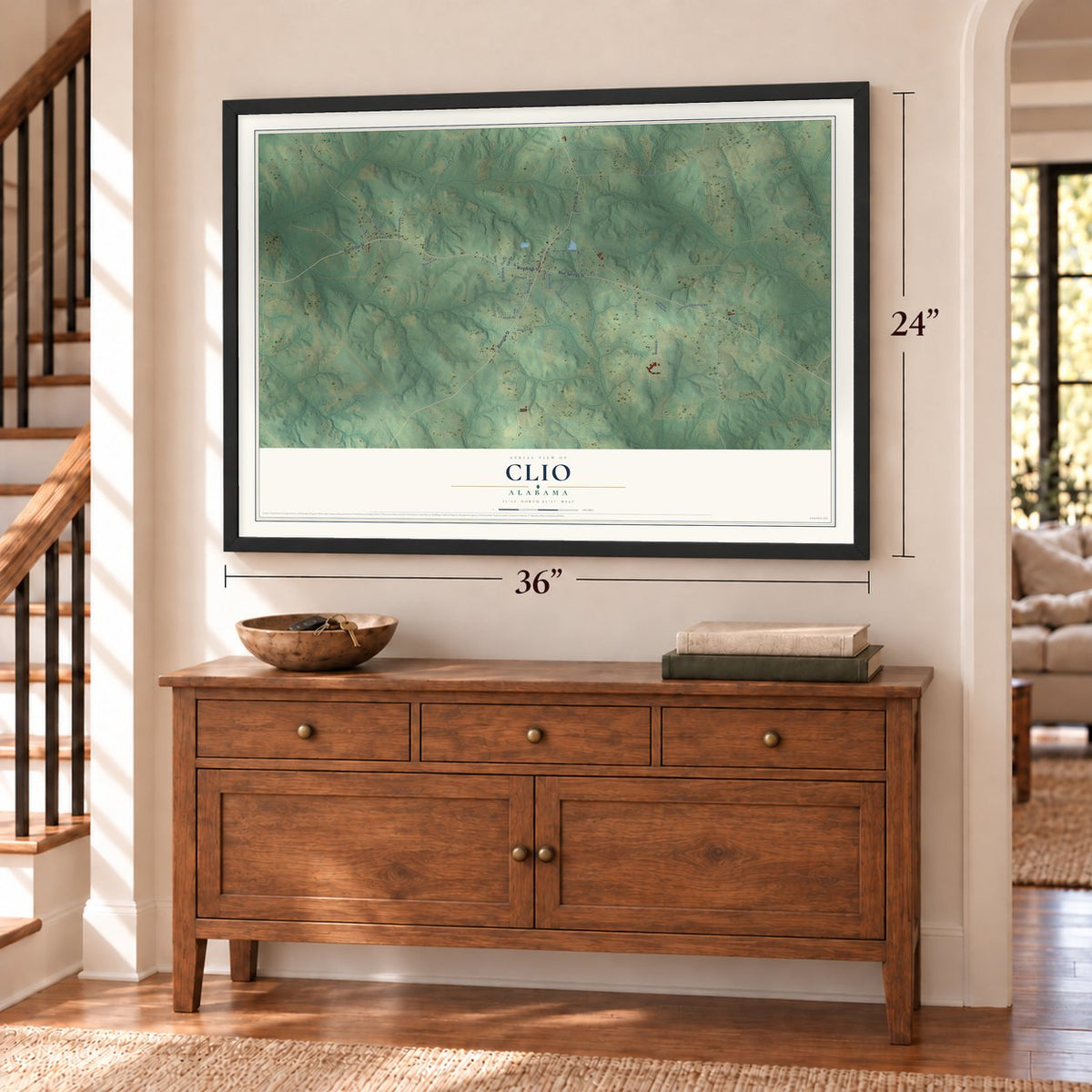 Clio, Alabama map, 24 x 36 inch print in a black frame above a dresser by a staircase