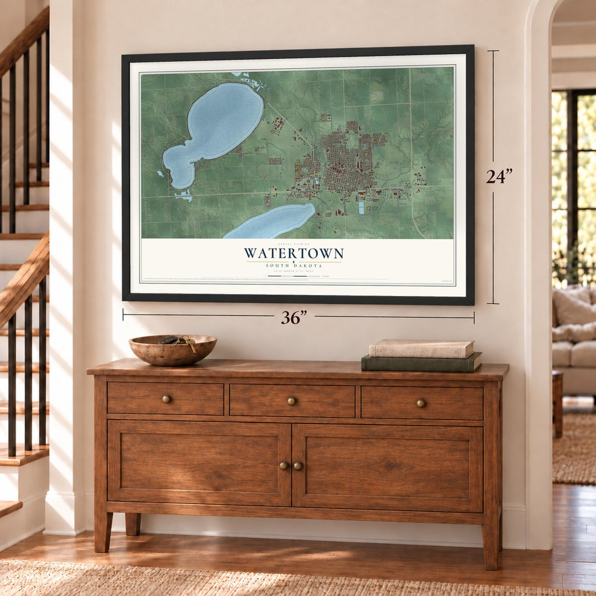Watertown, South Dakota map, 24 x 36 inch print in a black frame above a dresser by a staircase