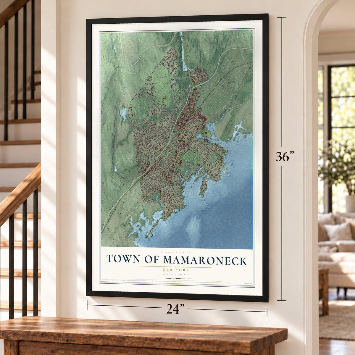 Town of Mamaroneck, New York map, 24 x 36 inch print in a black frame by a staircase
