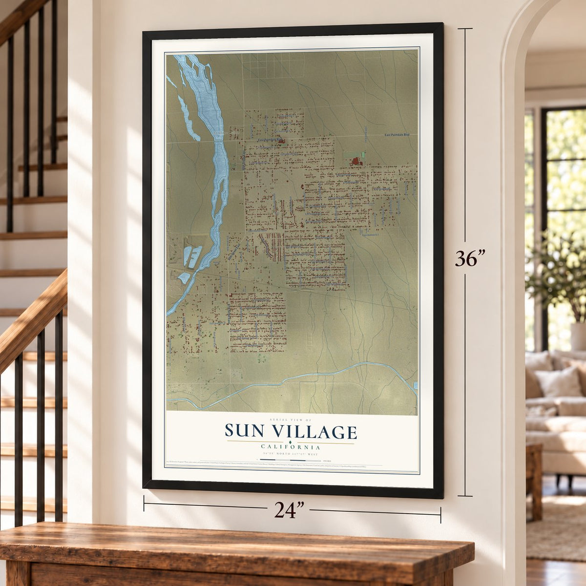 Sun Village, California map, 24 x 36 inch print in a black frame by a staircase
