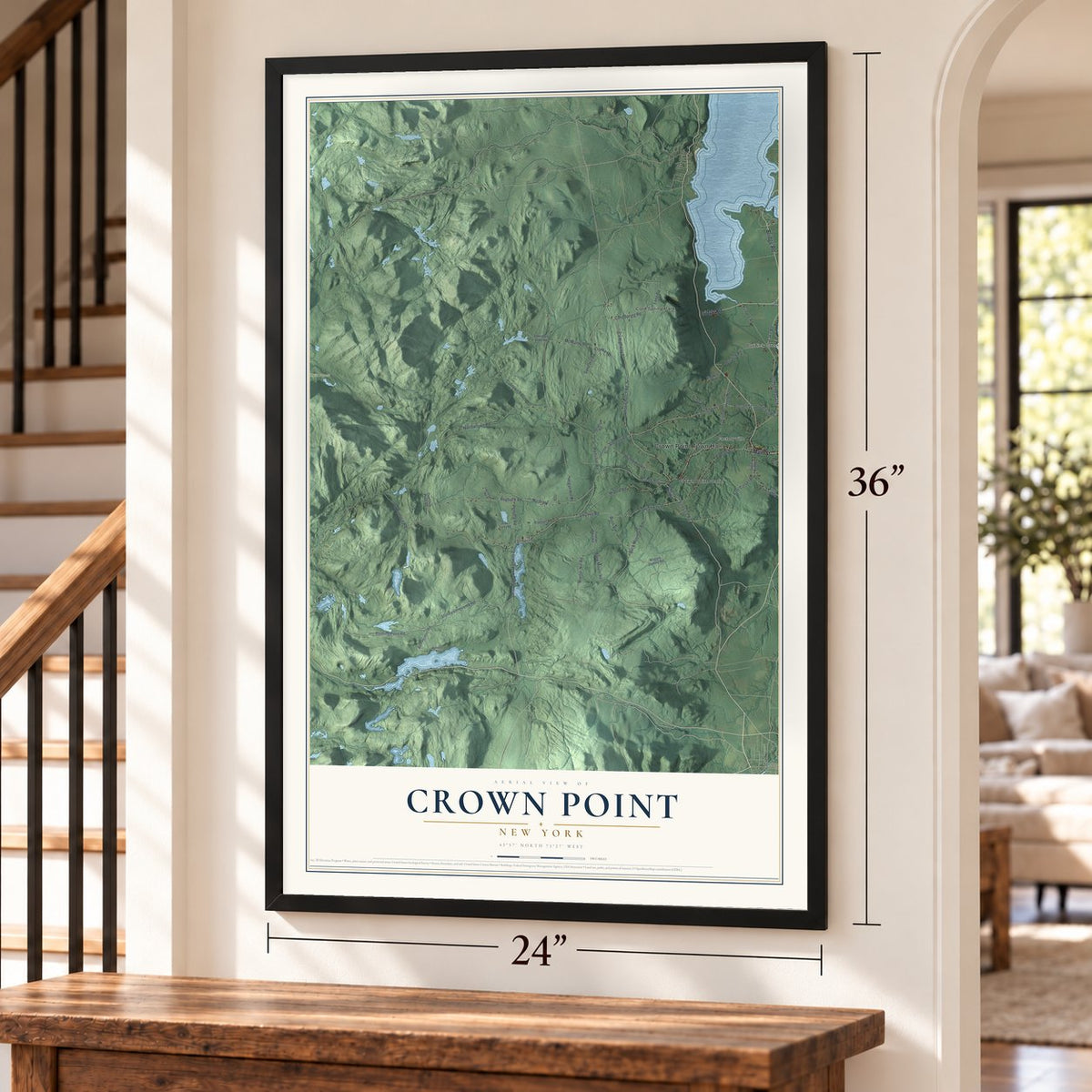 Crown Point, New York map, 24 x 36 inch print in a black frame by a staircase
